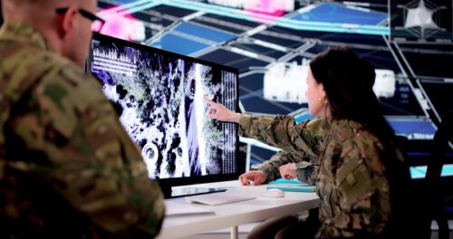 Technology Center Officer Analyzing Military Data On Army Computer System.
