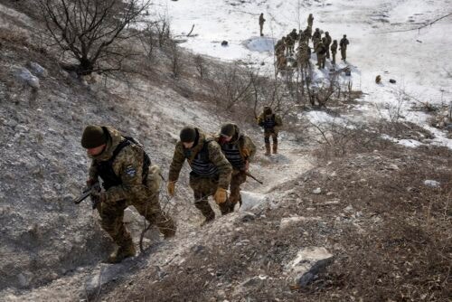 DONBAS, UKRAINE - FEBRUARY 24: Ukrainian replacement troops go through combat training on February 24, 2023 in the Donbas region of eastern Ukraine. According to the group's commander, the unit was badly depleted in recent weeks of vicious fighting against Russian Wagner mercenary forces, losing more than half its combat strength due to wounded and killed in action. He said that although his troops routinely decimate large groups of enemy forces, who attack his frontline positions in wave after wave of frontal assaults, the Russians still inflict significant damage. Fresh Ukrainian recruits are now being quickly trained, so the unit can return to the frontline at full strength. One year ago, Russia's military invaded Ukraine from three sides and launched airstrikes across the country. Since then, Moscow has withdrawn from north and central parts of Ukraine, focusing its assault on the eastern Donbas region, where it had supported a separatist movement since 2014.